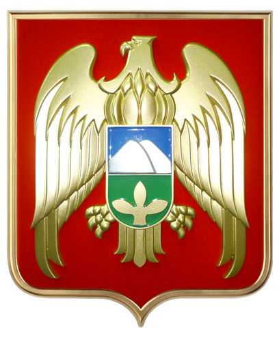 барельеф с изображением герба КБР